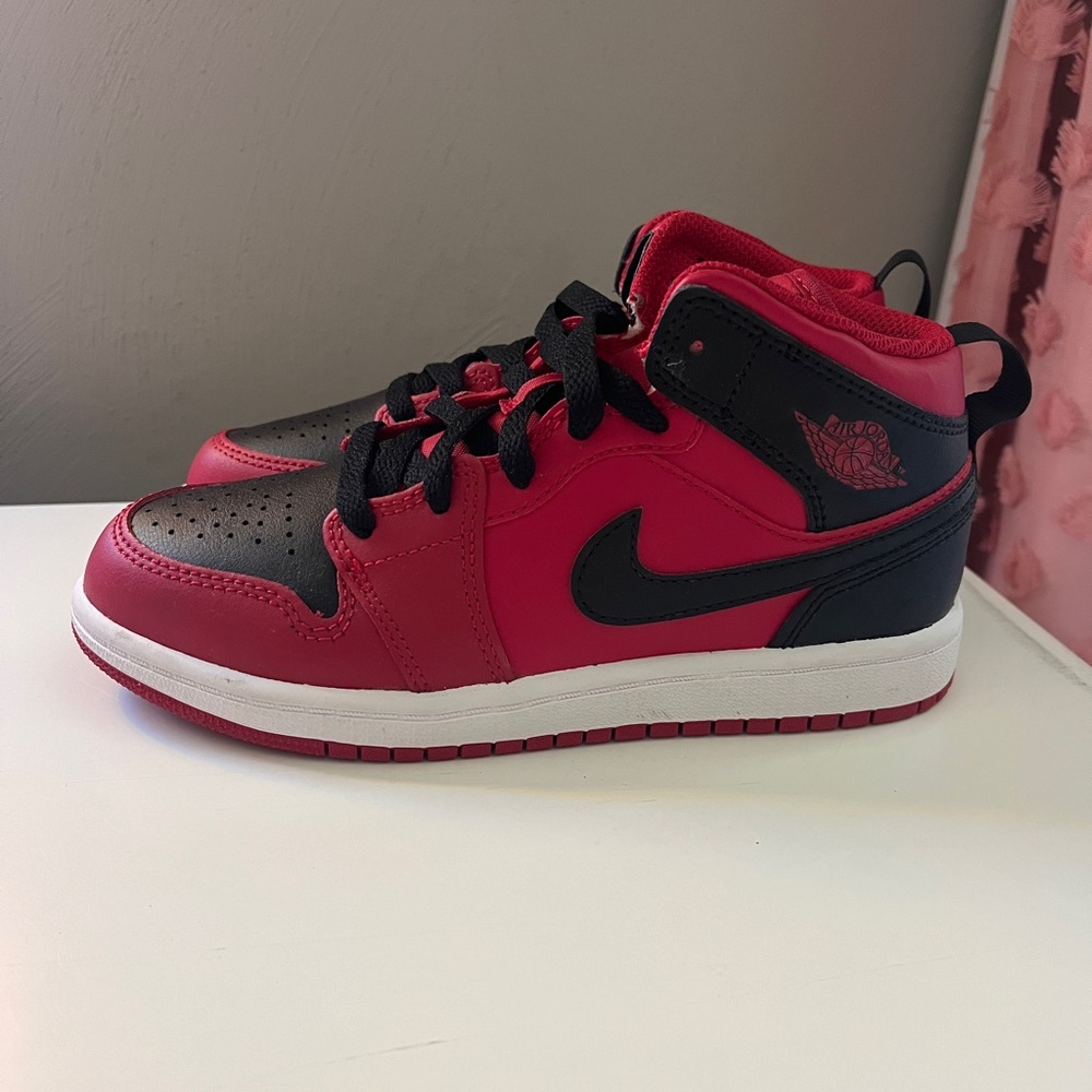 Kids size 1 red and black Nikes